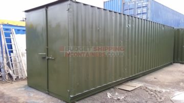 refurbished 30ft shipping container showing dents on the side walls