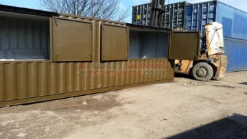 showing lockable serving hatches fitted into the side of a refurbished shipping container