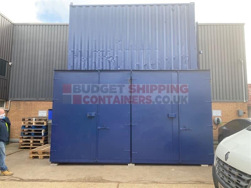 stack of blue shipping containers