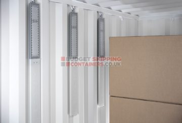 Absorpoles hanging inside a shipping container