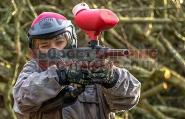 Shoote taking aim with paintball gun