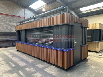 cladded container bar with roller shutter serving hatch