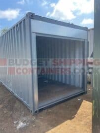electric shutter fitted to replace cargo doors in a repainted shipping container