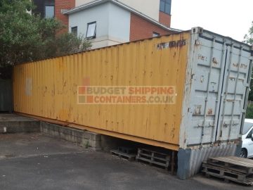 yellow damaged 40ft shipping container