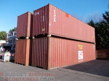 stack of 4 used 40ft high cube shipping containers