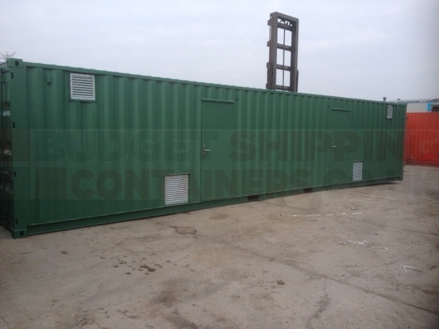 40-ft shipping container with 4 louvre vents and 2 personnel doors fitted to the side